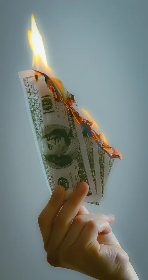 Inflation is like setting fire to a handful of $100 bills.