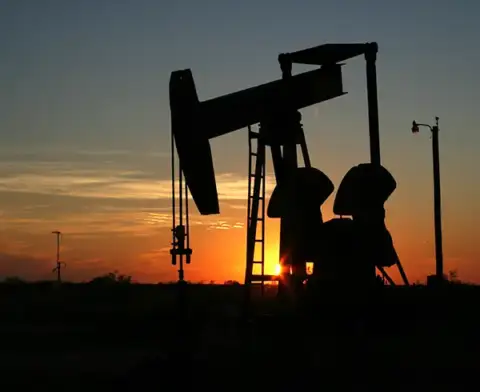 A Texas oil rig at dusk.