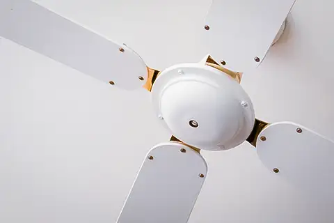 A ceiling fan that needs to be switched to circulate warm air in your home.